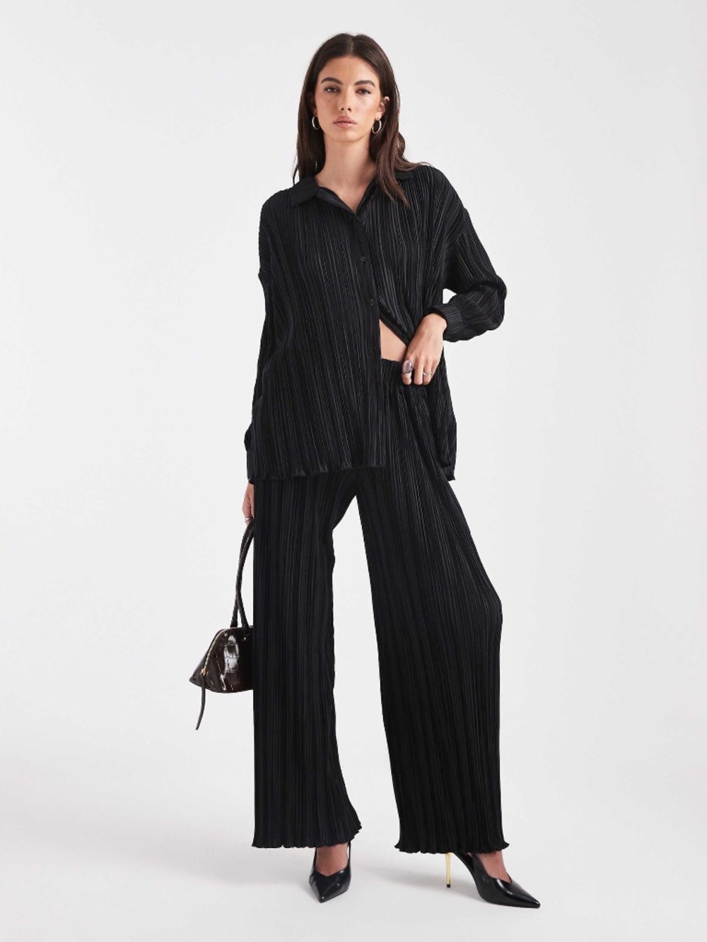 Black plissé pleated wide-leg pants and long-sleeve top